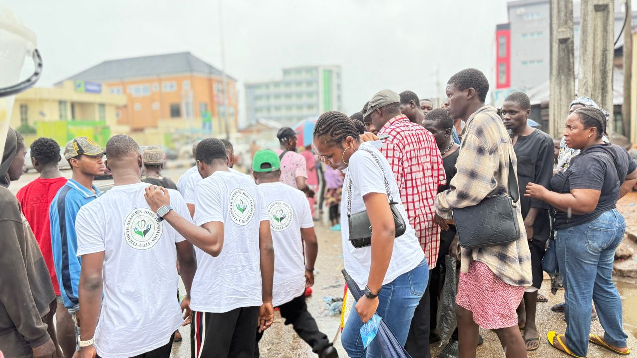 Foundation members engaging with community outdoors - ELIZABETH OSARIEMEN JOHN FOUNDATION making impact in Nigerian communities